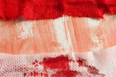 Gauze with blood on white backgroundの写真素材