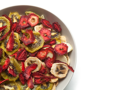 Different varieties mix of dried fruits in white plateの写真素材