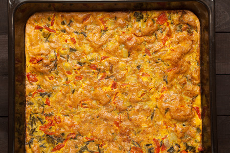 Scrambled eggs with red pepper and green onionの写真素材