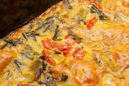Scrambled eggs with red pepper and green onionの写真素材