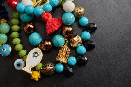 Jewelery from beads on blackboardの写真素材