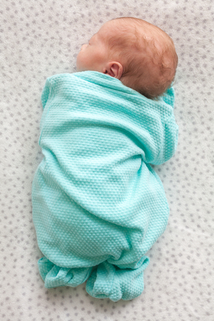 One month old baby. Sleepingの写真素材