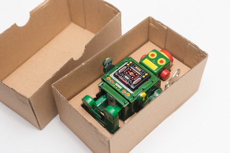 Robot in box on white backgroundの写真素材