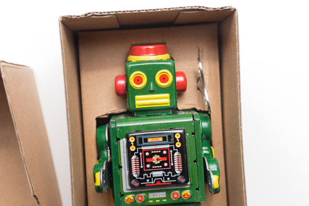 Robot in box on white backgroundの写真素材
