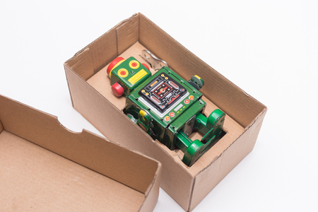 Robot in box on white backgroundの写真素材
