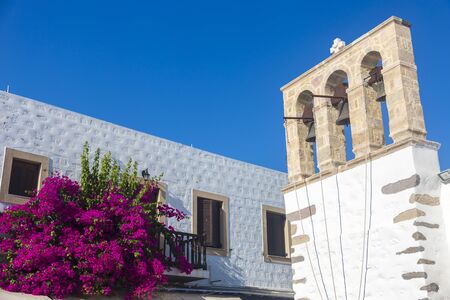 Belfry with tree bells in Mykonos - Greeceの写真素材