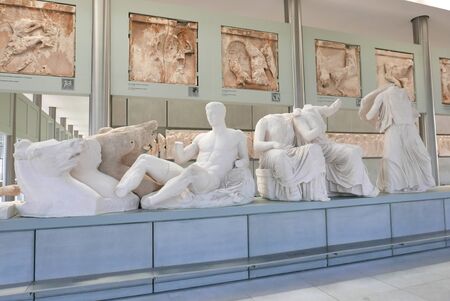 ATHENS, GREECE - AUGUST 24, 2018: Inside view of the Acropolis museum. Part of the Parthenon gallery. Metopes and pediment on the 3rd level of the New Acropolis Museum. Open to the public since 2009.のeditorial素材