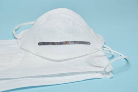 Disposable surgical face mask cover the mouth and nose. Healthcare and medical concept. Protect from Covid-19, Coronavirus, 2019-ncov, corona-virus. Can help protect wearers from getting others sick through their spit. Also for sick people and caretakersの写真素材