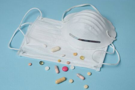 Disposable surgical face mask cover the mouth and nose. Healthcare and medical concept. Protect from Covid-19, Coronavirus, 2019-ncov, corona-virus. Can help protect wearers from getting others sick through their spit. Also for sick people and caretakersの写真素材
