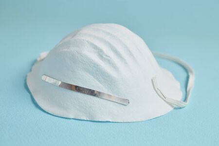 Disposable surgical face mask cover the mouth and nose. Healthcare and medical concept. Protect from Covid-19, Coronavirus, 2019-ncov, corona-virus. Can help protect wearers from getting others sick through their spit. Also for sick people and caretakersの写真素材