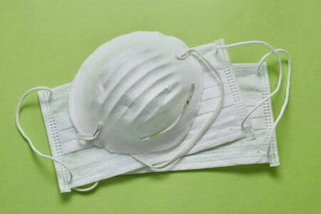 Disposable surgical face mask cover the mouth and nose. Healthcare and medical concept. Protect from Covid-19, Coronavirus, 2019-ncov, corona-virus. Can help protect wearers from getting others sick through their spit. Also for sick people and caretakersの写真素材