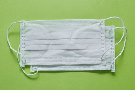 Disposable surgical face mask cover the mouth and nose. Healthcare and medical concept. Protect from Covid-19, Coronavirus, 2019-ncov, corona-virus. Can help protect wearers from getting others sick through their spit. Also for sick people and caretakersの写真素材