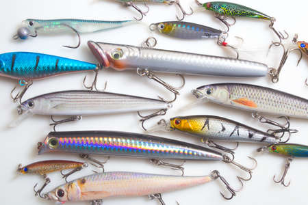 Fishing Lures with hooks on a white backgroundの写真素材