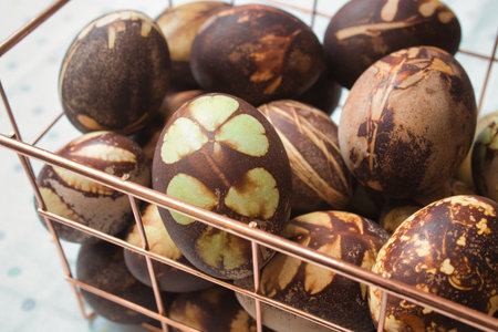 Ready-dyed eggs on table with natural colors obtained from various plants. No dyes and chemicalsの写真素材