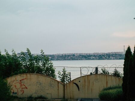summer beautyfull river behind the fence in the countryの写真素材