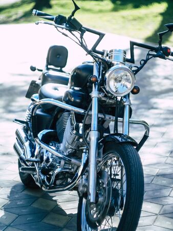 a motorcycle glistens in the sunの写真素材