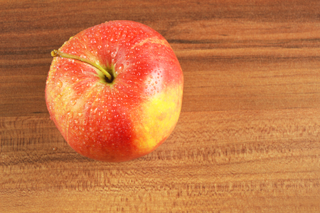 apple with wooden backgroundの写真素材