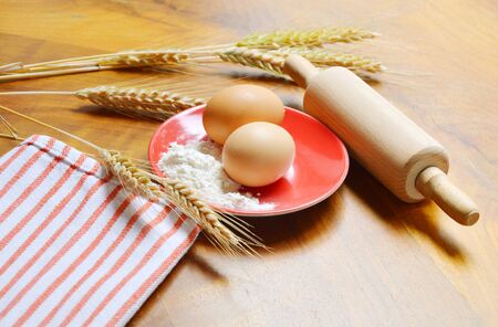 wheat with flour and eggの写真素材