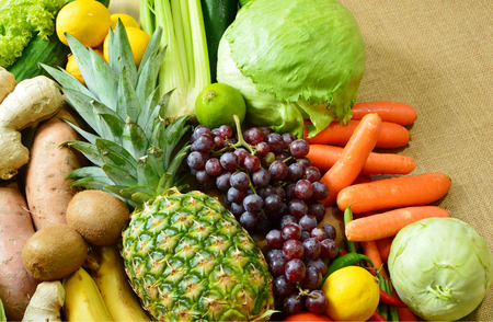 Colorful and various types of vegetables and fruits on sack background. Natural food for a better life.の写真素材