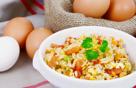 Fried rice with egg and various of vegetables. Rice and Egg menu for the children.の写真素材