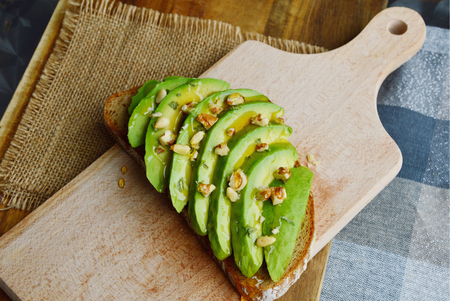 Avocado toast with walnuts and honey