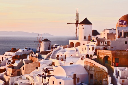 Oia village Thira Santorini Greece with sunset and blue sky.のeditorial素材