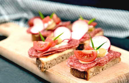 Rye bread with Salami and alot vegetable (German name is belegtes Brot)の写真素材