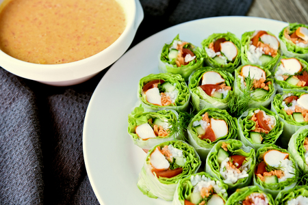 Salad roll with peanut spicy sauce healthy food menu.Mixed vegetables wrapped with rice noodles and...