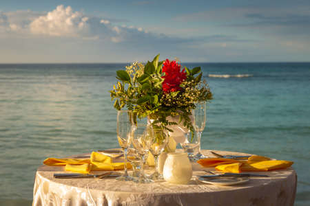 Romantic dinner: table for two and Beach Montego Bay - Jamaicaの写真素材