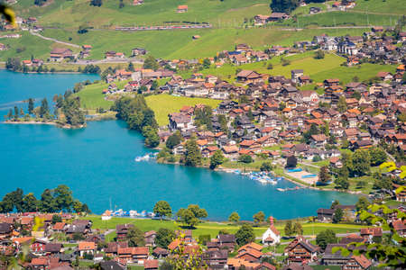 Lungern turquoise lake and village , canton of Obwalden in Switzerlandの写真素材