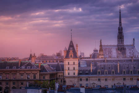 Saint Chapelle and quarter latin parisian roofs at golden sunrise Paris, Franceの写真素材