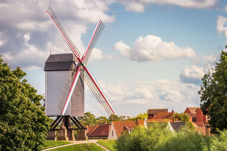 Rustic wooden windmills in Bruges public park, Belgium