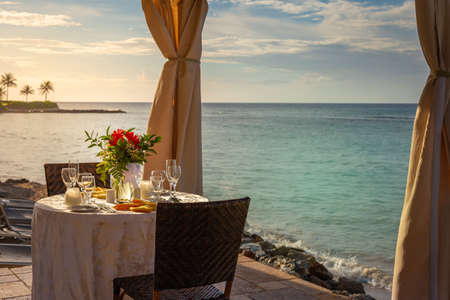 Romantic dinner: table for two and Beach with gazebo, Montego Bay, Jamaicaの写真素材