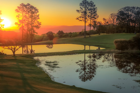 Southern Brazil countryside and lake landscape at peaceful sunsetの写真素材