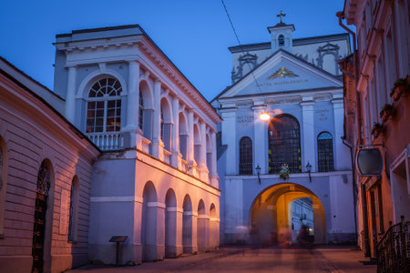 Vilnius old town, gtes of dawn street illuminated at night, Lithuania, Baltic statesの写真素材