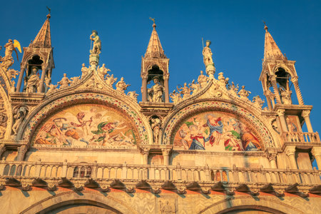 St Mark Basilica facade detail, with lion and angels, Venice, Italyの写真素材