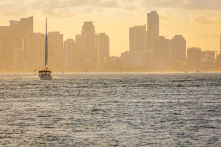 Miami sea habor at golden sunset with american flag, Florida, United Statesの写真素材