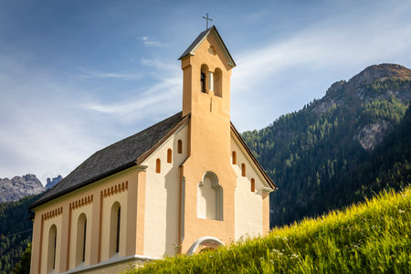 Idyllic landscape of Ardez church, Engadine, Swiss Alps, Switzerlandの写真素材