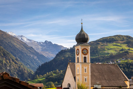 Idyllic landscape of church in Engadine valley, Swiss Alps, Switzerlandの写真素材