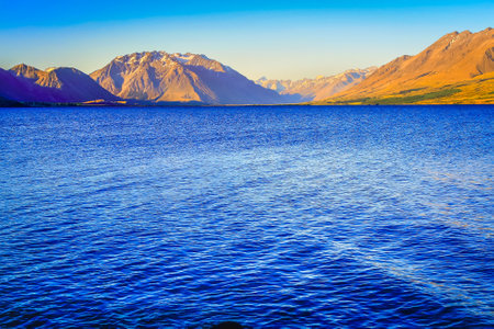 Lake Tekapo at peaceful evening, New Zealand South island idyllic landscapeの写真素材