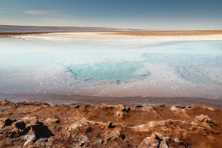 Salt lake, volcanic landscape at sunrise, Atacama, Chile border with Boliviaの写真素材