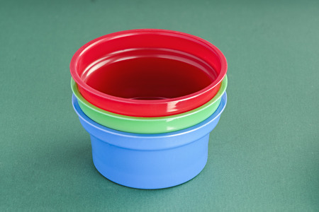 different color plastic cups for dairy productsの写真素材