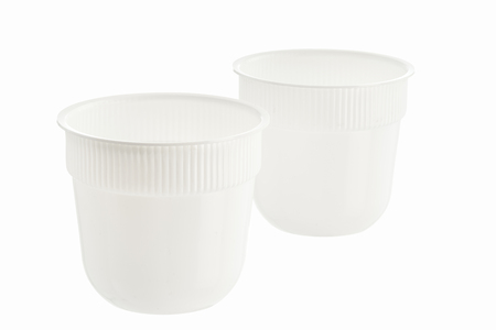 plastic white glasses of a container for food packaging on an isolated white backgroundの写真素材