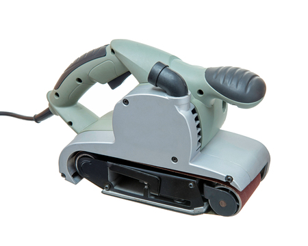 Vibro-grinder for repair and construction with belt-driven abrasive material, power tools, Power Tools for Construction and Repair, grinding tool isolated on white backgroundの写真素材