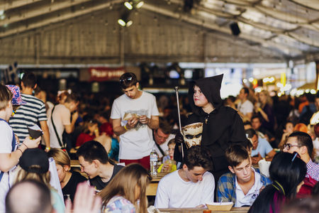 September 22, 2018 Kiev, Ukraine, Art Plant Platform. festival of modern pop culture COMIC CON. People at a dinner at the festivalのeditorial素材