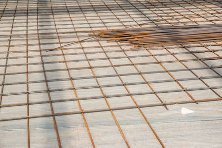 rebar at a construction site before pouring concrete for floors, closeupの写真素材