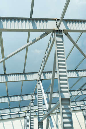 metal support poles in an industrial building warehouse