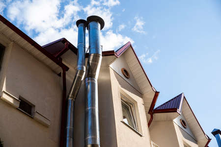 chrome pipes for exhaust and ventilation outside the building
