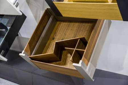 exhibition stand showing wooden furniture drawersの写真素材