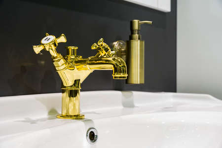 the installed modern mixer in a washstand in vintage styleの写真素材
